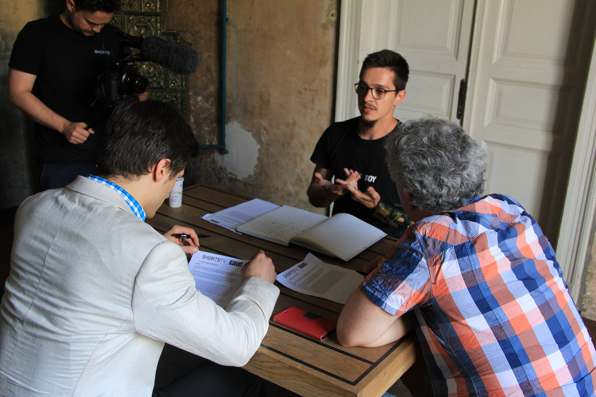 Our jury deliberating about who should win