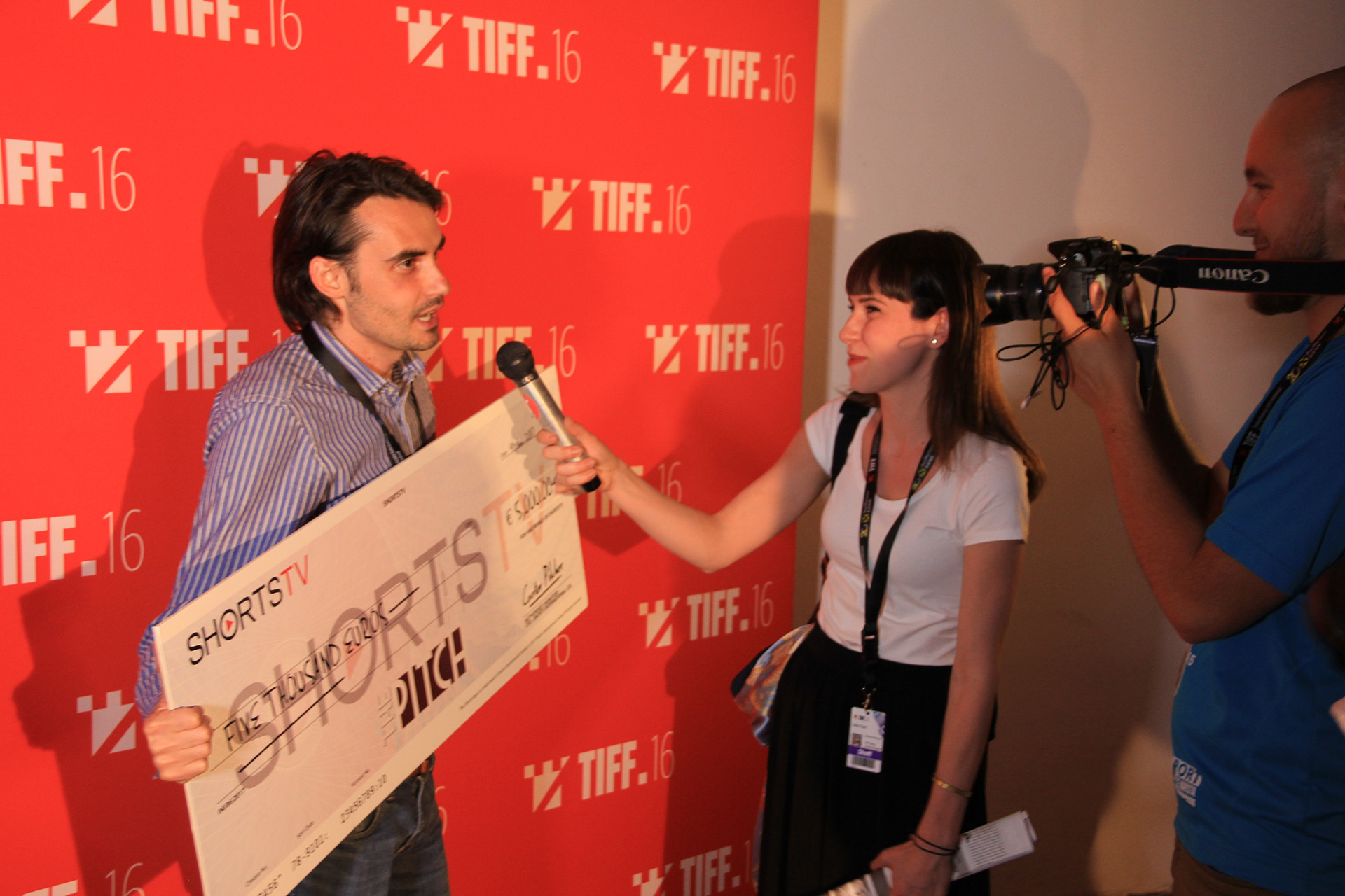 Bogdan Andrei Iliesiu being interviewed by the media